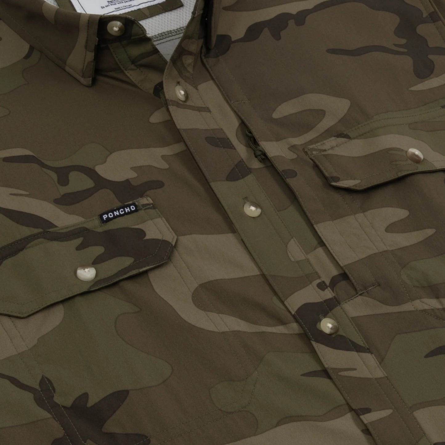 The Torcaza Long Sleeve by Poncho in Dark Camo